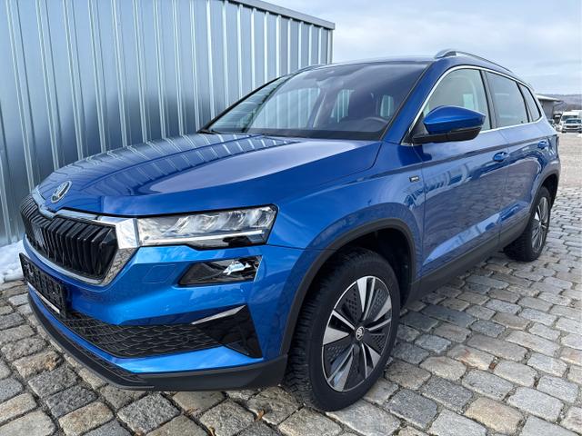 Skoda Karoq - DRIVE 1.5 TSI 150 PS DSG-Keyless-AppleCarPlay/AndroidAuto-Sunset-Tempomat-2 Zonen Klimaautomatik-SHZ-Lenkradheizung-Schaltwippen-Verkehrszeichenenrkennung-Tempomat-AutoHold-LED-PDC-Kamera-ALU-SOFORT