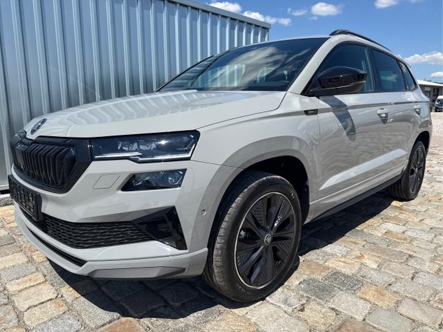 Skoda Karoq - Sportline 1,5 TSI 150 PS DSG -5 Jahre Garantie-Navi-4x Sitzheizung-Canton Sound-Anh&auml;ngerkupplung-LED-Matrix-AppleCarPlay-Android-Auto-ACC-Kessy-2-Zonen-Klimaautomatik-18''Alu-Sofort