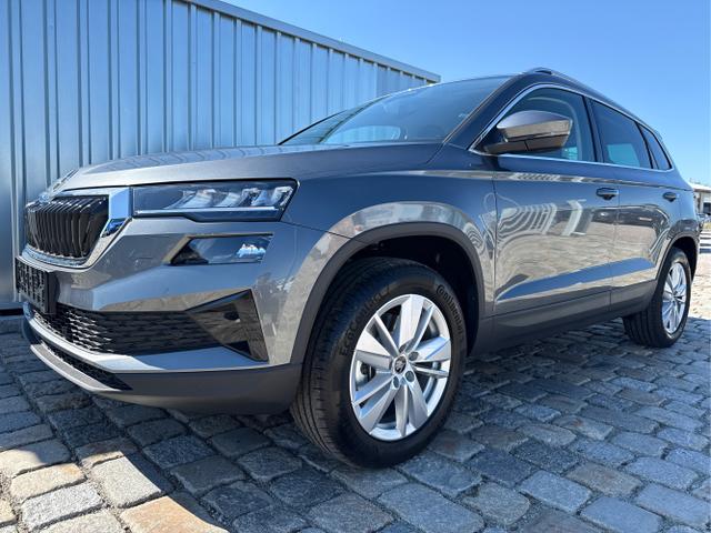 Skoda Karoq - EXTRA 2,0 TDI 4x4 150 PS DSG -5 Jahre Garantie-Anh&auml;ngerkupplung-ACC Tempomat-NAVI-AppleCarPlay-AndroidAuto-Sunset-2-Zonen-Klima-17''Alu-R&uuml;ckfahrkamera-Sofort