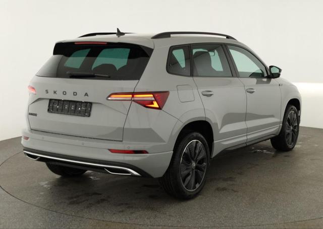 Skoda Karoq Sportline 1.5 TSI DSG Sportline, AHK, Navi, CANTON, Matrix, Kamera, el. Klappe, 5-J. Garantie 