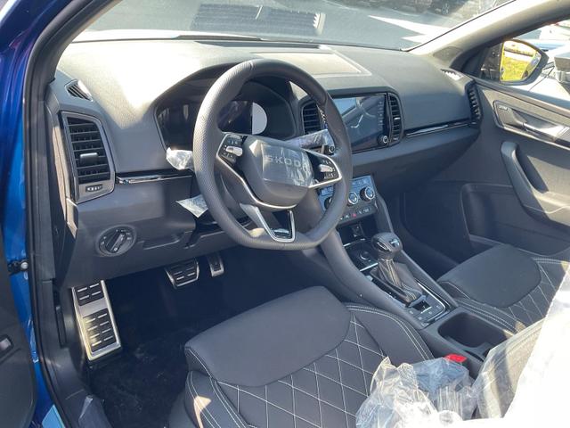 Skoda Karoq - Sportline 1.5 TSI DSG Sportline, AHK, Navi, CANTON, Matrix, AreaView, Side, Kamera, el. Klappe, FS-beheizbar, 5 J.-Garantie