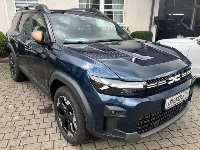 Dacia Bigster - Extreme Hybrid 155 inkl. Sitz- Lenkrad- und Scheibenheizung, el. Glasschiebedach, Navi, 18" Alus, Kamera, EPH, Keycard, Parkbremse el...