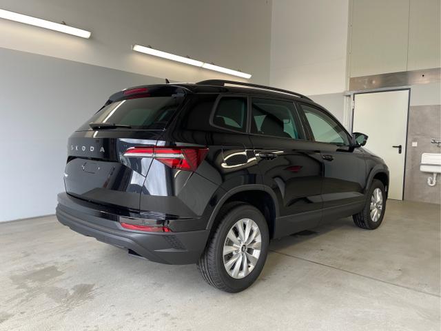 Skoda / Karoq / Schwarz / / / 150PS DSG AHK+Kessy