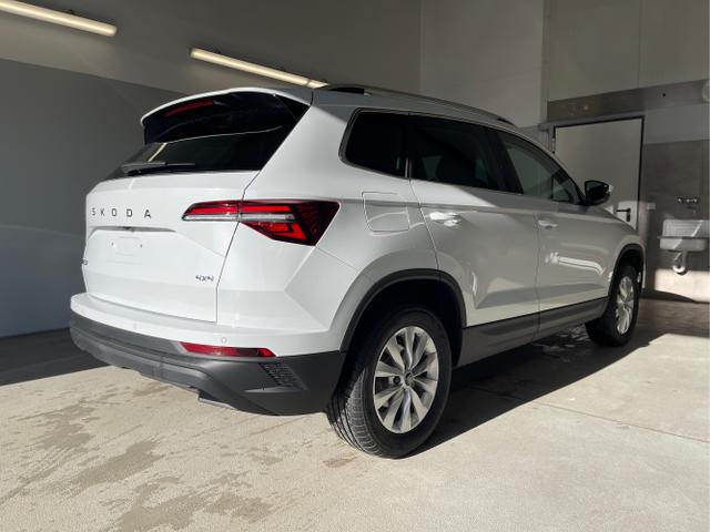 Skoda / Karoq / Weiß / / / 150PS TDI DSG 4x4 AHK+Navi+ACC+Kamera+Sitzheiz+eHeck+GV5