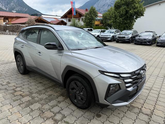 Hyundai TUCSON - 1.6 T-GDI Family AT 4WD,Navi,R-Cam,SHZ,AppCon.