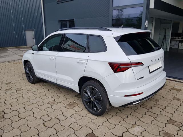 Skoda / Karoq / Weiß / / / Karoq Sportline 1,5TSI DSG 110KW Columbus, AHK, SHZ, Totwinkelassist, Virtual Pedal