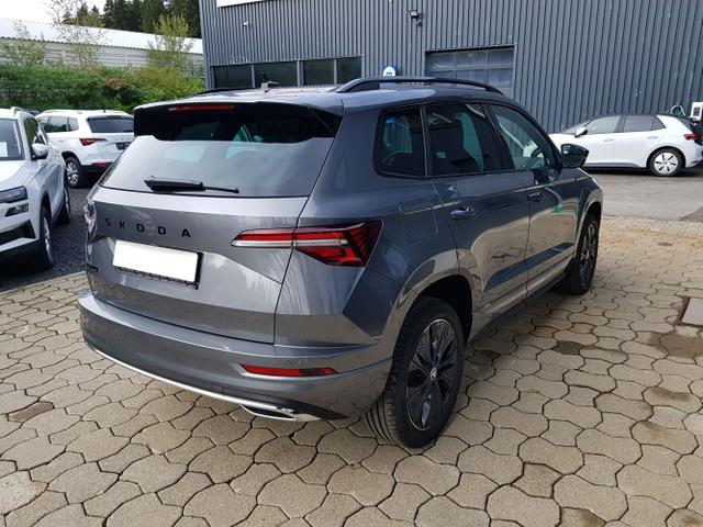 Skoda / Karoq / Grau / / / Karoq Sportline 1,5TSI DSG 110KW Columbus, AHK, SHZ, Totwinkelassist, Virtual Pedal