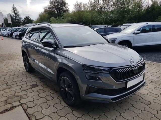 Skoda / Karoq / Grau / / / Karoq Sportline 1,5TSI DSG 110KW Columbus, AHK, SHZ, Totwinkelassist, Virtual Pedal