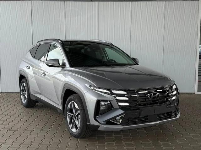 Hyundai TUCSON E-Motion 1.6 T-GDI 2WD 48V DCT / Panoramadach ACC Sitz + Lenkradheizung LED Navi PDC V&H Kamera Alu 18" 