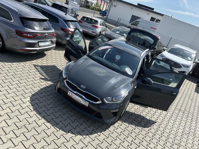 Kia Ceed Sportswagon - 1.0 T-GDI Edition 7*RÜCKFAHRKAMERA*GARANTIE*UNFALLFREI*1 HAND**M. AUSWEISBAR*ESP*SPURHALTEASSISTENT*REIFENDRUCKKONTROLLE*LENKRAD BEHEIZBAR*START/STOP AUTOMATIK*PARKSENSOR HINTEN*USB*ABS*KLIMA*APPLE-CAR-PLAY*ANDROID-AUTO*SITZHEIZUNG*LENKRAD BEHEIZBA