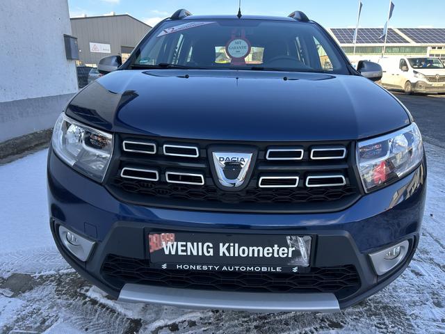 Dacia Logan MCV II 0.9 TCe 90 Stepway*GARANTIE*WINTERREIFEN*WEGFAHRSPERRE MIT TRANSPONDER*ABS*ESP*TAGFAHRLICHT LED*R&Uuml;CKFAHRKAMERA*NAVIGATION*TEMPOMAT*START/STOP AUTOMATIK*USB*AUX*KLIMA*FENSTERHEBER ELEKTR*ASR*FREISPRECHEINRICHTUNG*BLUETOOTH*BERGANFAHR-ASSISTE* 