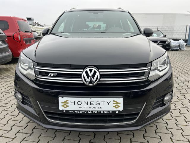 Volkswagen Tiguan 1.4 TSI BMT Sport & Style*NUR EXPORT ODER GEWERBE*AUTOMATIK*R&Uuml;CKFAHRKAMERA*NAVIGATION*AUTO-HOLD*ELEKTR.PARKBREMSE*ESP*START/STOP AUTOMATIK*SITZHEIZUNG*MULTIFUNKTIONSLENKRAD*TEMPOMAT*ABS*ASR*LICHT+SICHT PAKET*EDS*ESP*BLEUTOOTH*BI-XENON-SCHEINWERFER 