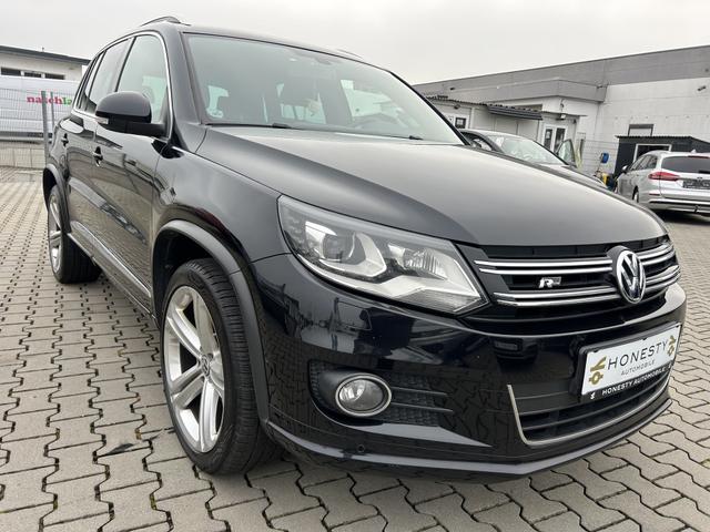 Volkswagen Tiguan 1.4 TSI BMT Sport & Style*NUR EXPORT ODER GEWERBE*AUTOMATIK*R&Uuml;CKFAHRKAMERA*NAVIGATION*AUTO-HOLD*ELEKTR.PARKBREMSE*ESP*START/STOP AUTOMATIK*SITZHEIZUNG*MULTIFUNKTIONSLENKRAD*TEMPOMAT*ABS*ASR*LICHT+SICHT PAKET*EDS*ESP*BLEUTOOTH*BI-XENON-SCHEINWERFER 