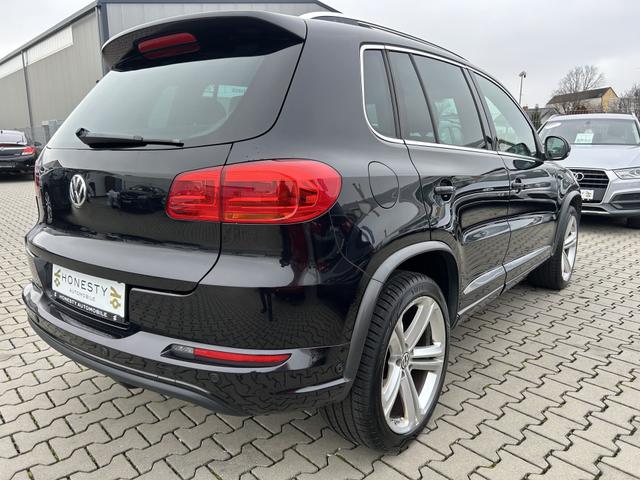 Volkswagen Tiguan 1.4 TSI BMT Sport & Style*NUR EXPORT ODER GEWERBE*AUTOMATIK*R&Uuml;CKFAHRKAMERA*NAVIGATION*AUTO-HOLD*ELEKTR.PARKBREMSE*ESP*START/STOP AUTOMATIK*SITZHEIZUNG*MULTIFUNKTIONSLENKRAD*TEMPOMAT*ABS*ASR*LICHT+SICHT PAKET*EDS*ESP*BLEUTOOTH*BI-XENON-SCHEINWERFER 