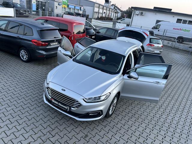 Ford Mondeo Turnier 2.0 EcoBlue Titanium S/S*GARANTIE*8XREIFEN*SITZHEIZUNG VORNE HINTEN*R&Uuml;CKFAHRKAMERA*ANH&Auml;NGERKUPPLUNG*NACIGATIONSYSTEM/ABS*AS*SCHECKHEFTGEPFLEGT*WINTERR-PAKET*RU&szlig;PARTIKELFILTER*PARKBREMSE ELEKTR.*M.AUSW*NOTBREMS-ASSISTENT*KLIMAAUTOMATIK*EURO6D-TEM 