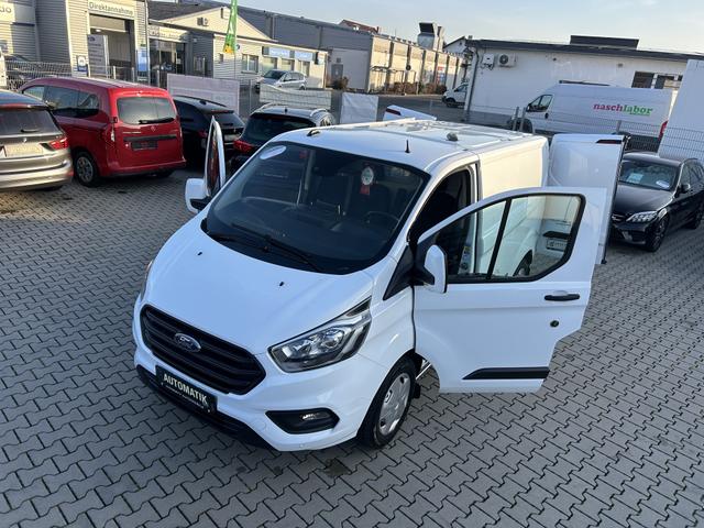 Ford Transit Custom 2.0 TDCi 300 L1 Trend*AUTOMATIK*GARANTIE*FRONTSCHEIBE BEHEIZBAR*ANH&Auml;NGERKUPPLUNG*8XREIFEN*INKL. ZUBEH&Ouml;R SIEHE FOTO*MULTIFUNKTIONSLENKRAD*DRIVE MODE*KLIMA*NAVIGATON*BLUETOOTH*TELEFON*APPLE-CAR-PLAY*TAGFAHRLICHT LED*SCHIEBET&Uuml;R RECHTS*TEMP 