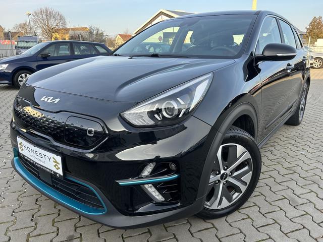 Kia Niro - e-Niro Edition 7*SPURHALTEASSISTENT*T&Uuml;V BIS 02/2027*MULTIFUNKTIONSLENKRAD*R&Uuml;CKFAHRKAMERA*AUTO-HOLD*ELEKTR.PARKBREMSE*TAGFAHRLICHT LED*ABS*ESP/ESC*FRONTSCHEIBE SOLAR-REFLECT*DRIVE-ATTENTION-WARNING*KLIMAAUTOMATIK*M&Uuml;DIKEITS-ERKENNUNGSSENOR*W&Auml;RMESCHUTZVE