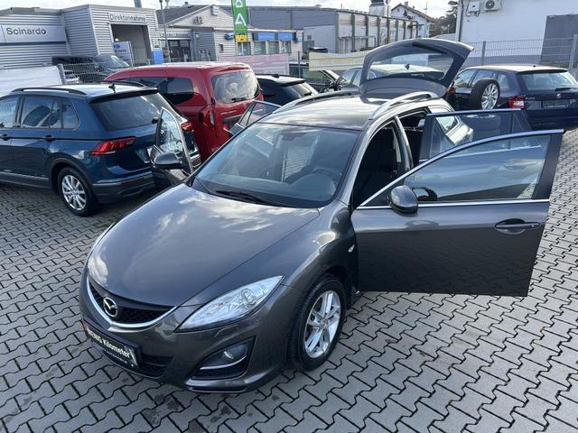 Mazda Mazda6 Kombi 6 2.0 Active*WENIG KM*SITZHEIZUNG*MULTIFUNKTIONSLENKRAD*KLIMAAUTOMATIK*6 GANG*MP3*8XREIFEN*ZENTRALVERRRIEGLUNG*VERGLASUNG GET&Ouml;NT*SPURWECHSELASSISTENT*BLUETOOTH*ABS*DSC*EBD*NOTBREMS-ASSISTENT*BERGANFAHRHILFE*TEMPOMAT*NEBELSCHEINWERFER*CD-WECHSLER*DSC*1 HA 