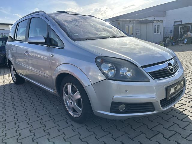 Opel Zafira - 1.9 CDTI DPF Cosmo 7 SITZER*EXPORT ODER GEWERBE BEVORZUGT*AUTOMATIK*PANORAMADACH*TEILLEDER*MULTIFUNKTONSLENKRAD*SERVOLENKUNG*W&Auml;RMESCHUTZVERGLASUNG*SPORTSITZE VORNE*ABS*ESP*ELEKTR.TRAKTIONSKONTROLLE*CD-PLAYER*LICHT-PAKET*DACHRELING*5 T&Uuml;RIG*TEMPOMA
