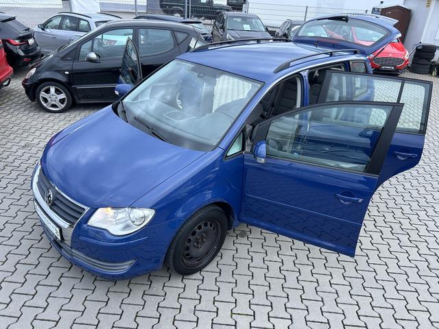 Volkswagen Touran 1.4 TSI Trendline*7 SITZER*ANH&Auml;NGERKUPPLUNG*T&Uuml;V NEU*8XREIFEN*SCHECKHEFTGEPFLEGT*KLIMA*6 GANG*CD-PLAYER*ABS*ESP*METALLIC-LACKIERUNG*AUTOMATISCHE FAHRLICHTSCHALTUNG*SCHEINWERFER-REINIGUNGSANLAGE*SERVOLENKUNG ELEKTR. GESTEUERT*RADIO*WEGFAHRSPERRE* 