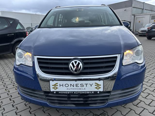 Volkswagen Touran 1.4 TSI Trendline*7 SITZER*ANH&Auml;NGERKUPPLUNG*T&Uuml;V NEU*8XREIFEN*SCHECKHEFTGEPFLEGT*KLIMA*6 GANG*CD-PLAYER*ABS*ESP*METALLIC-LACKIERUNG*AUTOMATISCHE FAHRLICHTSCHALTUNG*SCHEINWERFER-REINIGUNGSANLAGE*SERVOLENKUNG ELEKTR. GESTEUERT*RADIO*WEGFAHRSPERRE* 