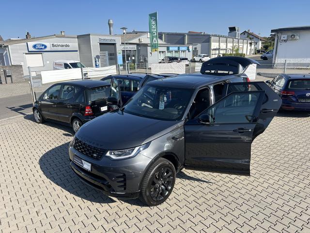 Land Rover Discovery 5 D250 R-Dynamic SE*7 SITZER*M.AUSWEISBAR*TOTER-WINKEL-ASSISTENT*WINTER-PAKET*FAMILY-PAKET*KEYLESS-ENTRY*RU&szlig;PARTIKELFILTER*AD-BLUE*NAVIGATION*R&Uuml;CKFAHRKAMERA V+H*BREMSASSISTENT*REIFEN VORNE NEU*MILD-HYBRID-SYSTEM*HECKLEUCHTEN LED* 