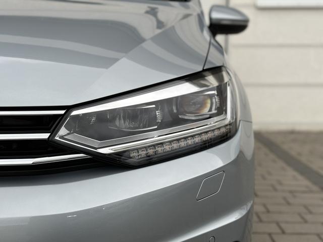 Volkswagen Touran Limited 1.5 TSI OPF DSG IQ.Light+7-Sitzer+4 J. Garantie! 