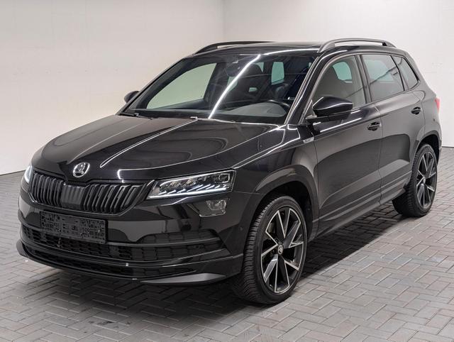 Gebrauchtfahrzeug Skoda Karoq - Sportline 4x4 Standhz/AHK/Pano/DCC/Canton