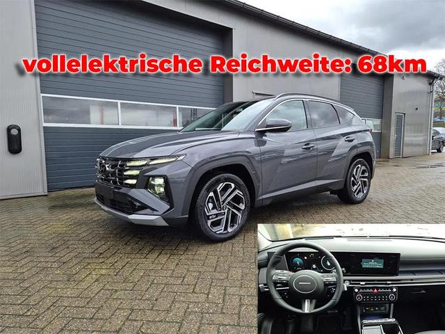 Hyundai TUCSON - 1.6 T-GDI 252PS Automatik PHEV Prime FACELIFT MY2025 Voll-Leder elektr. Heckklappe Sitzheizung v+h Lenkradheizung ACC Klimaautomatik HUD Navi Krell-Sound 12,3"-Touchscreen DAB+ wireless Apple CarPlay + Android Auto PDC 4xKamera 2xKeyless 19-LM Vorlauffahrzeuge