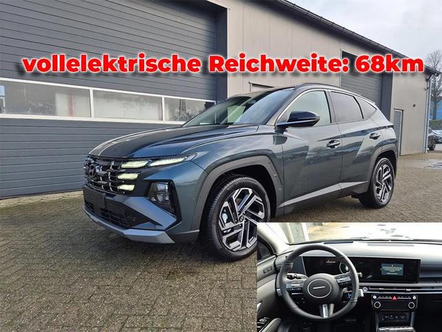 Hyundai TUCSON - 1.6 T-GDI 252PS Automatik PHEV Prime FACELIFT MY2025 Voll-Leder elektr. Heckklappe Sitzheizung v+h Lenkradheizung ACC Klimaautomatik HUD Navi Krell-Sound 12,3"-Touchscreen DAB+ wireless Apple CarPlay + Android Auto PDC 4xKamera 2xKeyless 19-LM Vorlauffahrzeuge