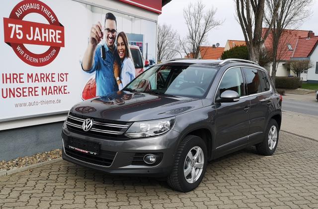 Volkswagen Tiguan - Sport & Style 2.0 TDI - R-Line/AHK/1.Hand/Extras