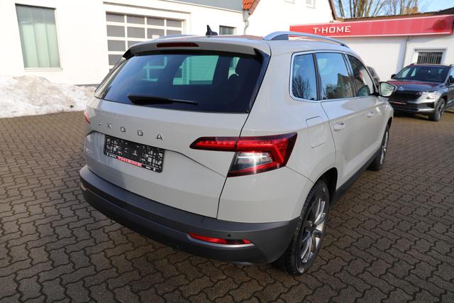 Skoda Karoq Style 1.5l TSI 150PS DSG RFK/AHK/Navi/el. Heckkl./NW-Garantie! 