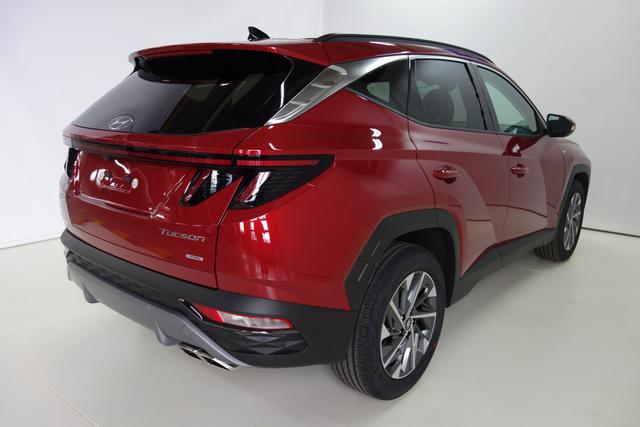Tucson NX4 Trend Line 1,6 CRDi 4WD 48V DCT t1dt1 Sunset Red 019456