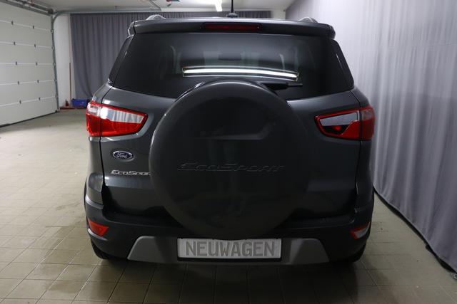 Ford Eco Sport Titanium1.0 125PS Magnetic Grau Sitzbezug / Polsterung: Teilleder schwarz "Winterpaket Navigationssystem dunkle Scheiben hinten Dachreling Reserverad LED-Scheinwerfer Anschlussgarantie, Laufzeit 3 Jahre im Anschluss an die Herstellergarantie. maximale Gesamtlaufleistung 100 000 km"