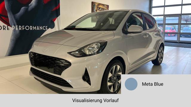 Hyundai i10 - GO+ 1.2 MT 58 kW (79 PS) Klimaautomatik, Navigationssystem, Apple CarPlay & Android Auto, Sitzheizung, Lenkradheizung, Einparkhilfe hinten, R&uuml;ckfahrkamera, Privacy Glass, 15" Leichtmetallfelgen, uvm. Lagerfahrzeug
