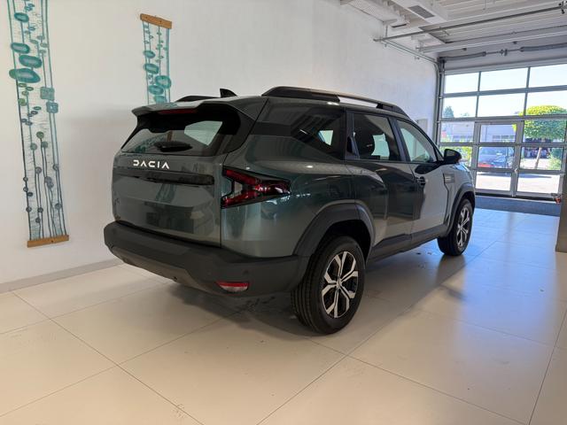 Dacia Bigster Zeder Gruen