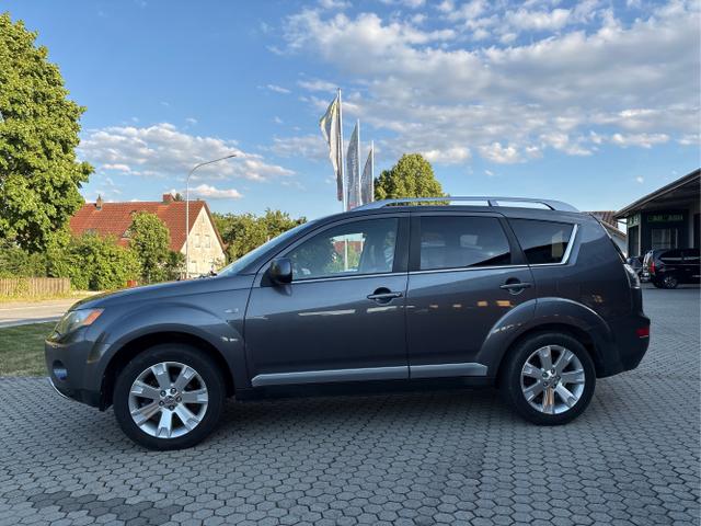 Mitsubishi / Outlander / Grau / / / Outlander 2.2 DI-D Instyle ALLRAD 7-SITZER ! ANH&Auml;NGERKUPPLUNG + KLIMAAUTOMATIK + TEMPOMAT + SITZHEIZUNG + SCHIEBEDACH GLAS + ALUFELGENG 18 + MULTILENKRAD + XENON SCHEINWERFER 