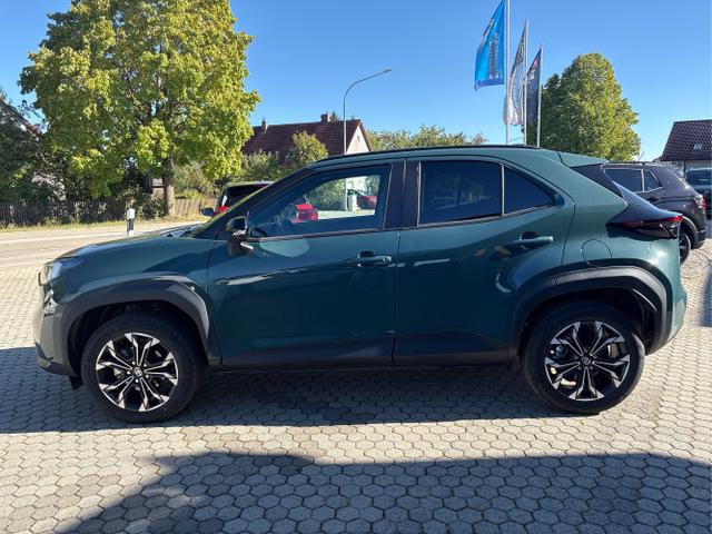 Volkswagen / Polo / Gr&uuml;n / / / Yaris Cross 1.5 VVT-iE Hybrid Teamplayer AUTOMATIK! MODEL 2026 ! + TECHNIK-PAKET + ALU GLANZGEDREHT 17 + WINTERPAKET + TEMPOMAT MIT ACC + PDC + KAMERA + SOFORT VERF&Uuml;GBAR !