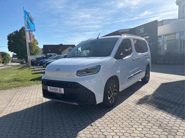 Toyota Proace City Verso - L2 Teamplayer 1.2 7-SITZER -TEMPOMAT-R&Uuml;CKFAHRKAMERA-KLIMAAUTOMATIK-PDC-SITZHEIZUNG-SPURHALTEASSISTENT-BLUETOOTH-SMART KEY SYSTEM-GESCHWINDIGKEITSBEGRENZER-DAB-ABLAGE PAKET... MODELL "2026" + 15 JAHRE GARANTIE!