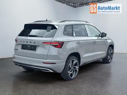 Skoda Karoq Sportline 1,5 TSI DSG 2ZKlimaautomatik Canton Anh&auml;ngerkupplung Totewinkel Assistent 2 x Einparkhilfe Kamera 19 Zoll Felgen adaptiver Tempomat 5J Garantie 