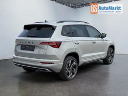 Skoda Karoq Sportline 1,5 TSI DSG 2ZKlimaautomatik Canton Anh&auml;ngerkupplung Totewinkel Assistent 2 x Einparkhilfe Kamera 19 Zoll Felgen adaptiver Tempomat 5J Garantie 