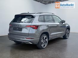 Skoda Karoq Sportline 1,5 TSI DSG 2ZKlimaautomatik Canton Anh&auml;ngerkupplung Totewinkel Assistent 2 x Einparkhilfe Kamera 19 Zoll Felgen adaptiver Tempomat 5J Garantie 