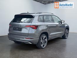 Skoda Karoq Sportline 1,5 TSI DSG 2ZKlimaautomatik Canton Anh&auml;ngerkupplung Totewinkel Assistent 2 x Einparkhilfe Kamera 19 Zoll Felgen adaptiver Tempomat 5J Garantie 