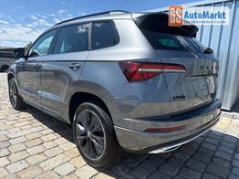 Skoda Karoq Sportline 1,5 TSI 150 PS DSG -5 Jahre Garantie-Navi-4x Sitzheizung-Canton Sound-Anh&auml;ngerkupplung-LED-Matrix-AppleCarPlay-Android-Auto-ACC-Kessy-2-Zonen-Klimaautomatik-18''Alu-Sofort 