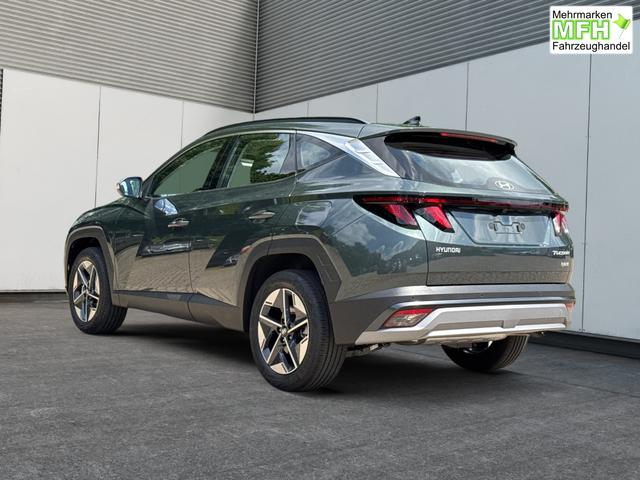 Hyundai / TUCSON / Gr&uuml;n / / / Hybrid NAVI+KAMERA+SHZ+LED+TEMPOMAT+17 ALU+PDC, Bei den verwendeten Bildern kann es sich um Beispielbilder handeln, ggf. teilweise mit Sonderausstattung.