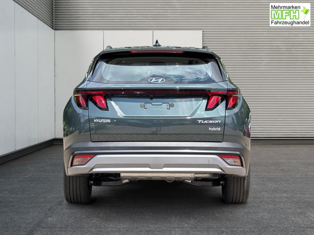 Hyundai / TUCSON / Gr&uuml;n / / / Hybrid NAVI+KAMERA+SHZ+LED+TEMPOMAT+17 ALU+PDC, Bei den verwendeten Bildern kann es sich um Beispielbilder handeln, ggf. teilweise mit Sonderausstattung.