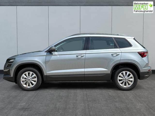 Skoda / Karoq / Silber / / / AHK+el.HECKKLAPPE+KAMERA+PDC+ACC, Bei den verwendeten Bildern kann es sich um Beispielbilder handeln, ggf. teilweise mit Sonderausstattung.