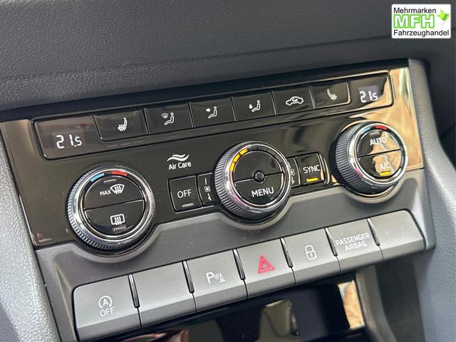 Skoda / Karoq / Silber / / / AHK+el.HECKKLAPPE+KAMERA+PDC+ACC, Bei den verwendeten Bildern kann es sich um Beispielbilder handeln, ggf. teilweise mit Sonderausstattung.
