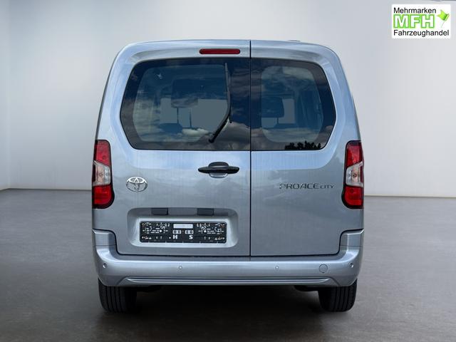 Toyota Proace City Verso 1,2 L2 Business 7 Sitzer Klima Einparkhilfe Apple Tempomat DAB 10 Zoll Display Regensensor 