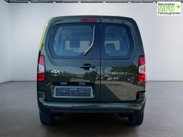 Toyota Proace City Verso 1,2 L2 Business 7 Sitzer Klima Einparkhilfe Apple Tempomat DAB 10 Zoll Display Regensensor 
